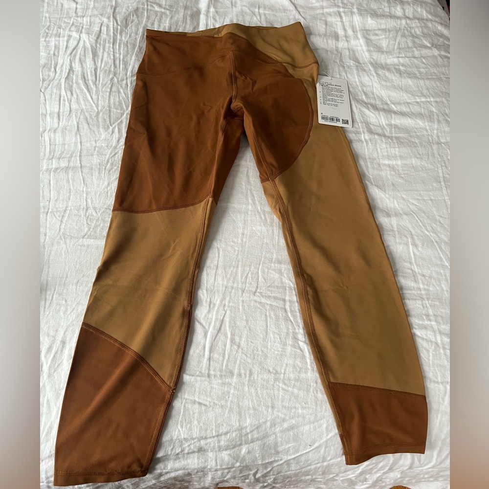 Lululemon BRAND NEW leggings. Nulu colorblock tight 25”. Size 8